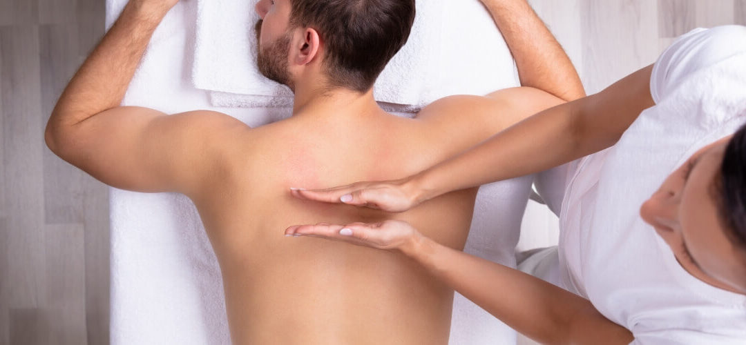 Athlete receiving therapeutic massage support