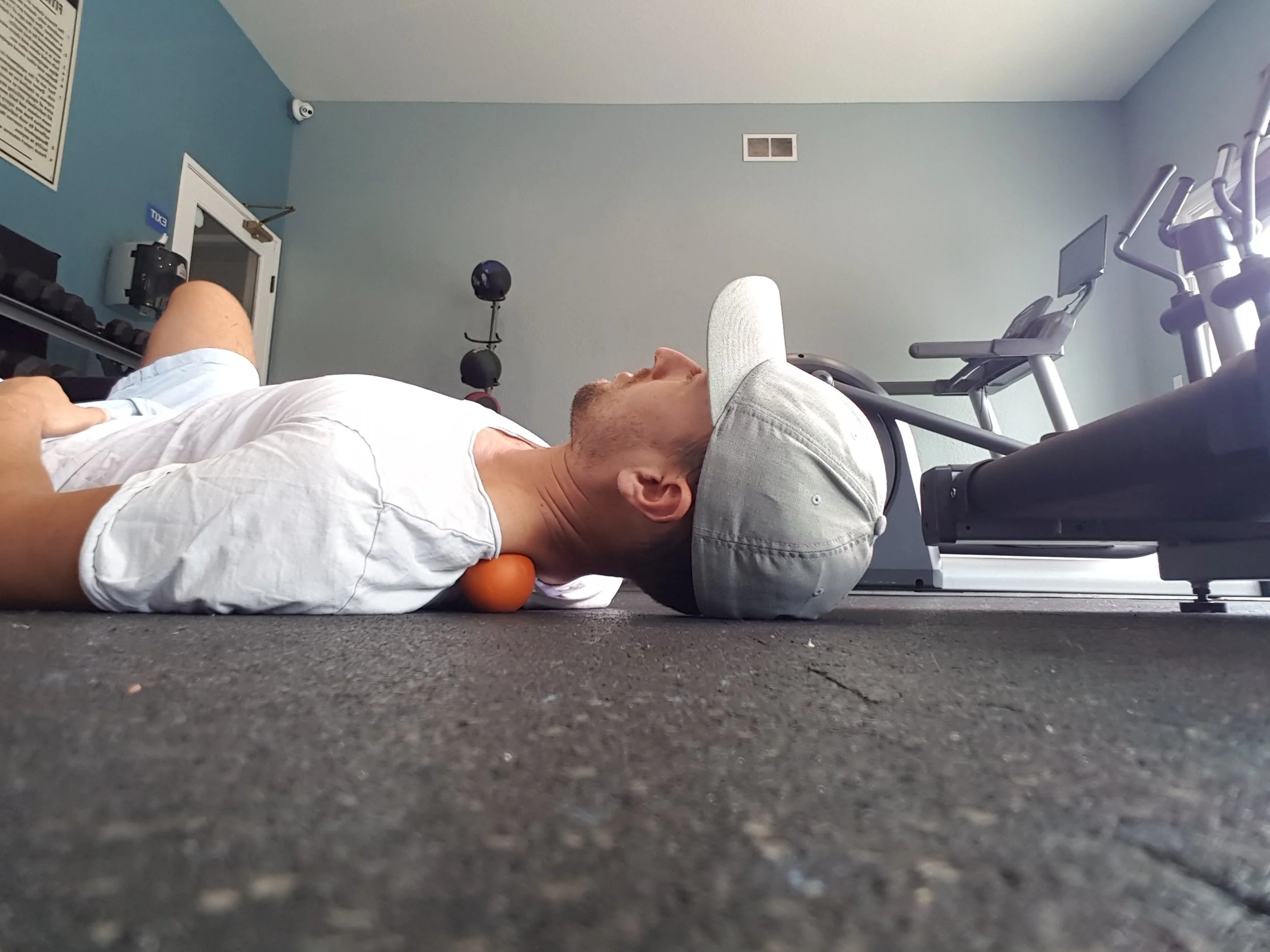grant of your wellness nerd using a lacrosse ball to free up his upper back