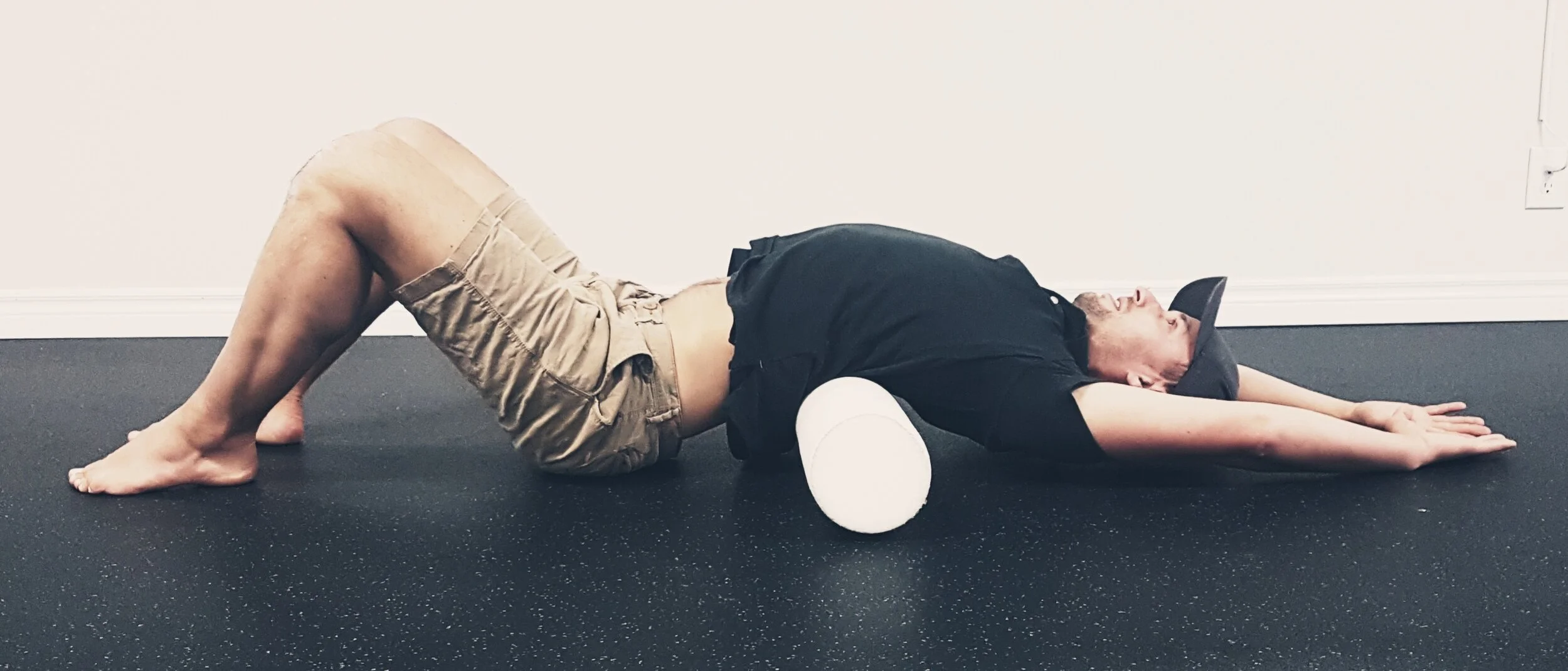 foam roller exercise for lower back lying down
