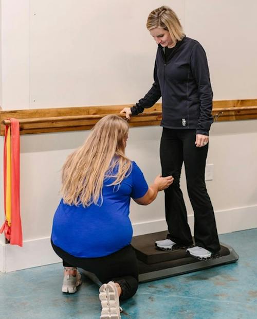 A patient doing a strengthening exercise at PAR Physical Therapy